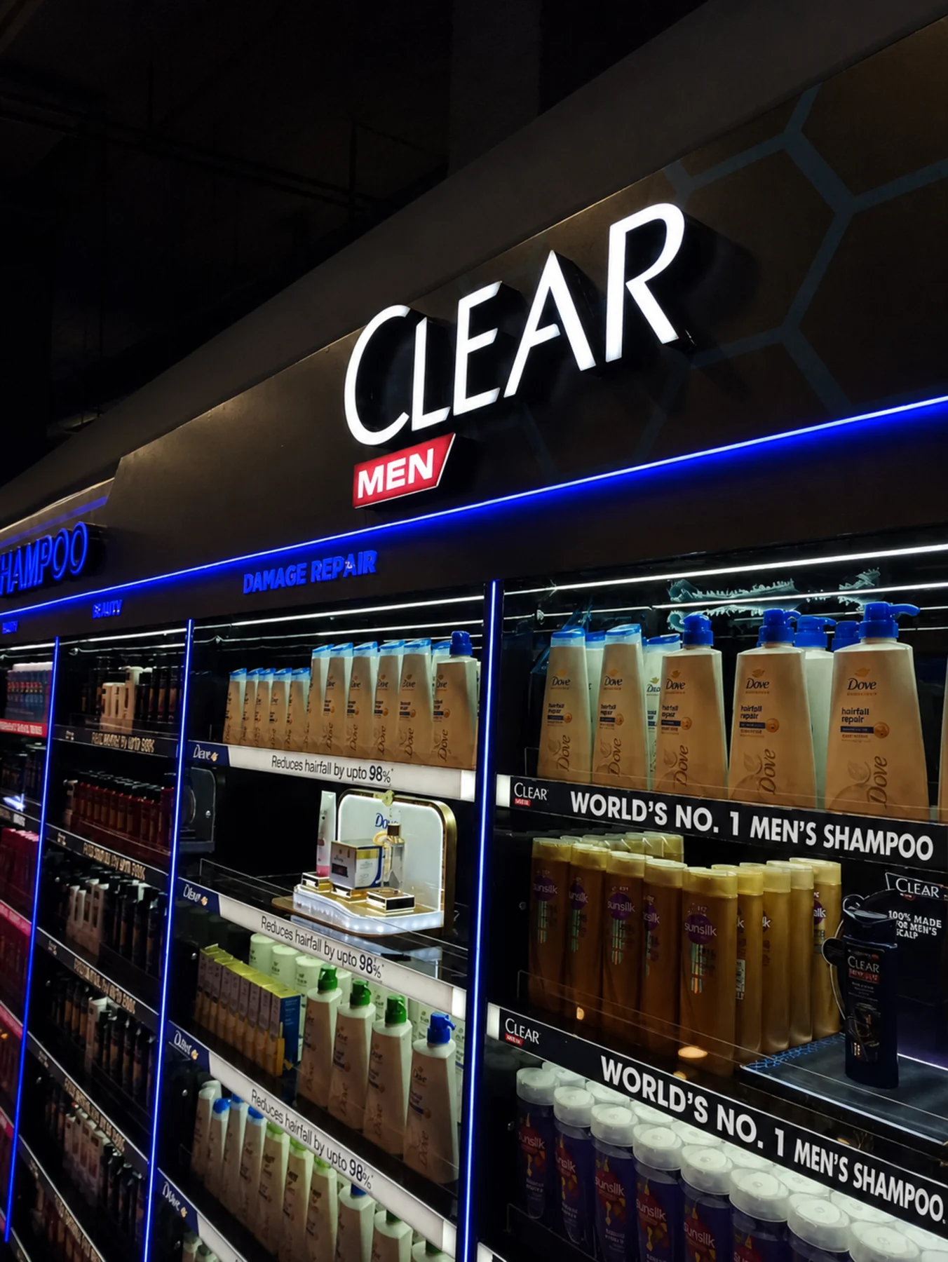 Illuminated Clear Men fascia and circular light feature