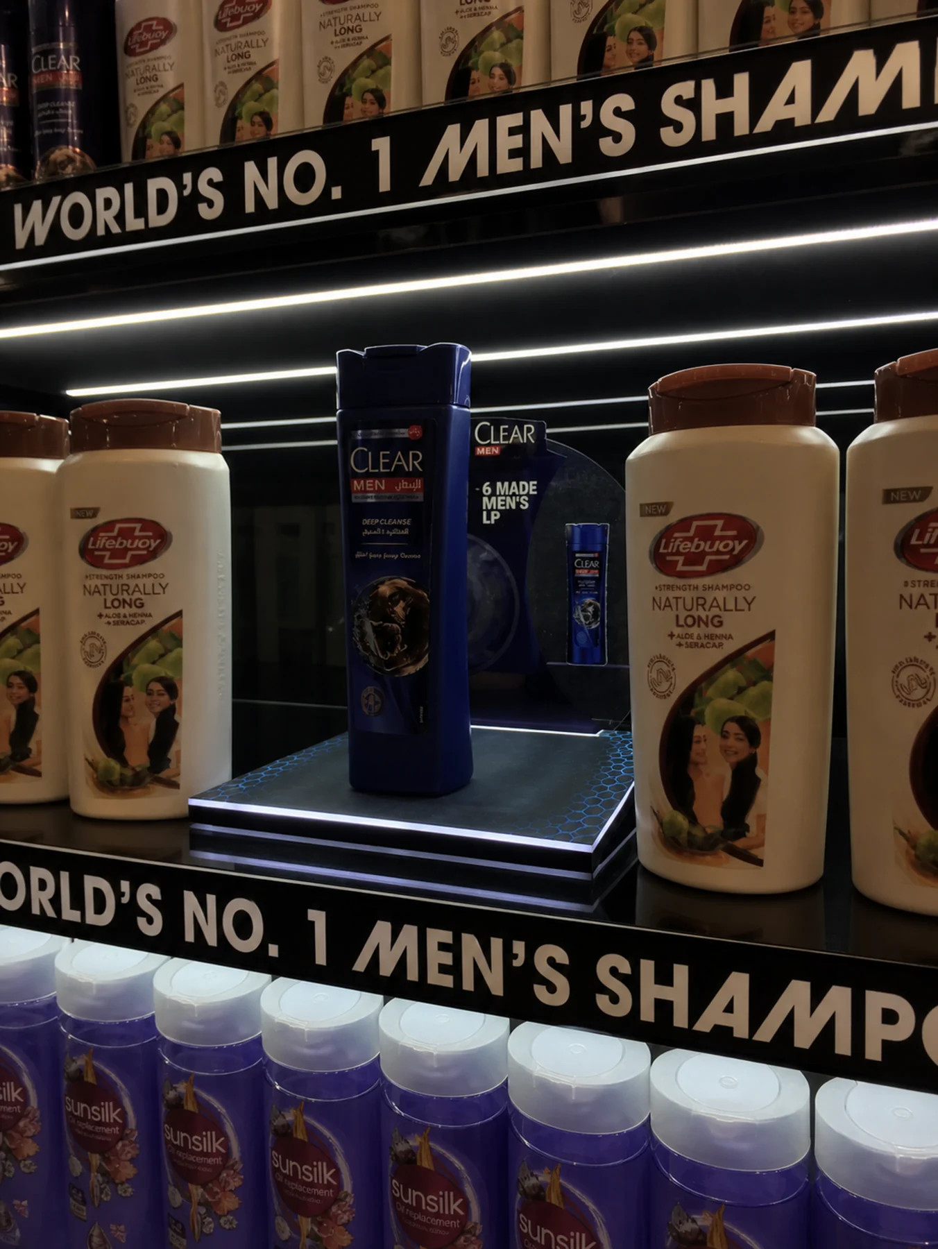 Clear Men illuminated shelf-level product highlight plinth
