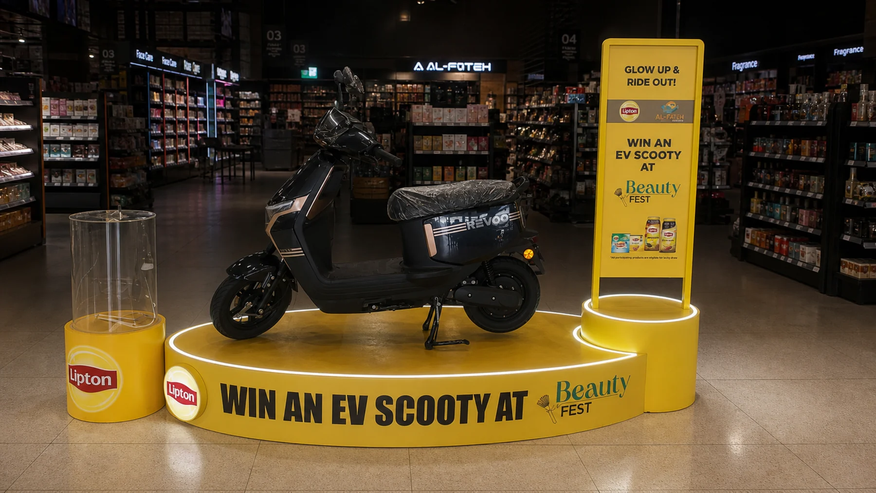Lipton EV scooty podium with the scooter on the Al-Fateh store floor