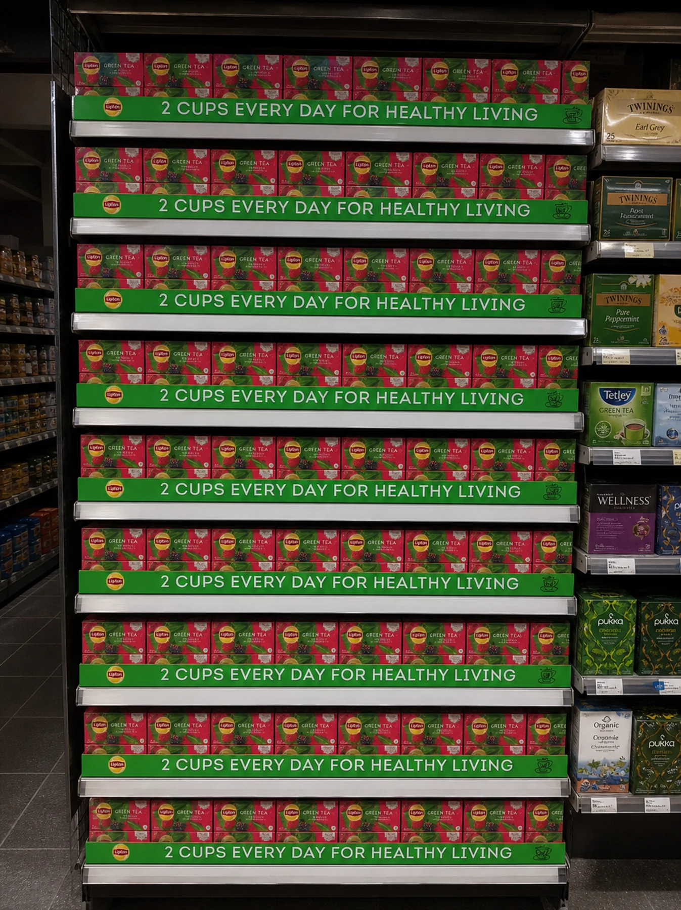 Lipton shelf strips running along a stocked tea shelf