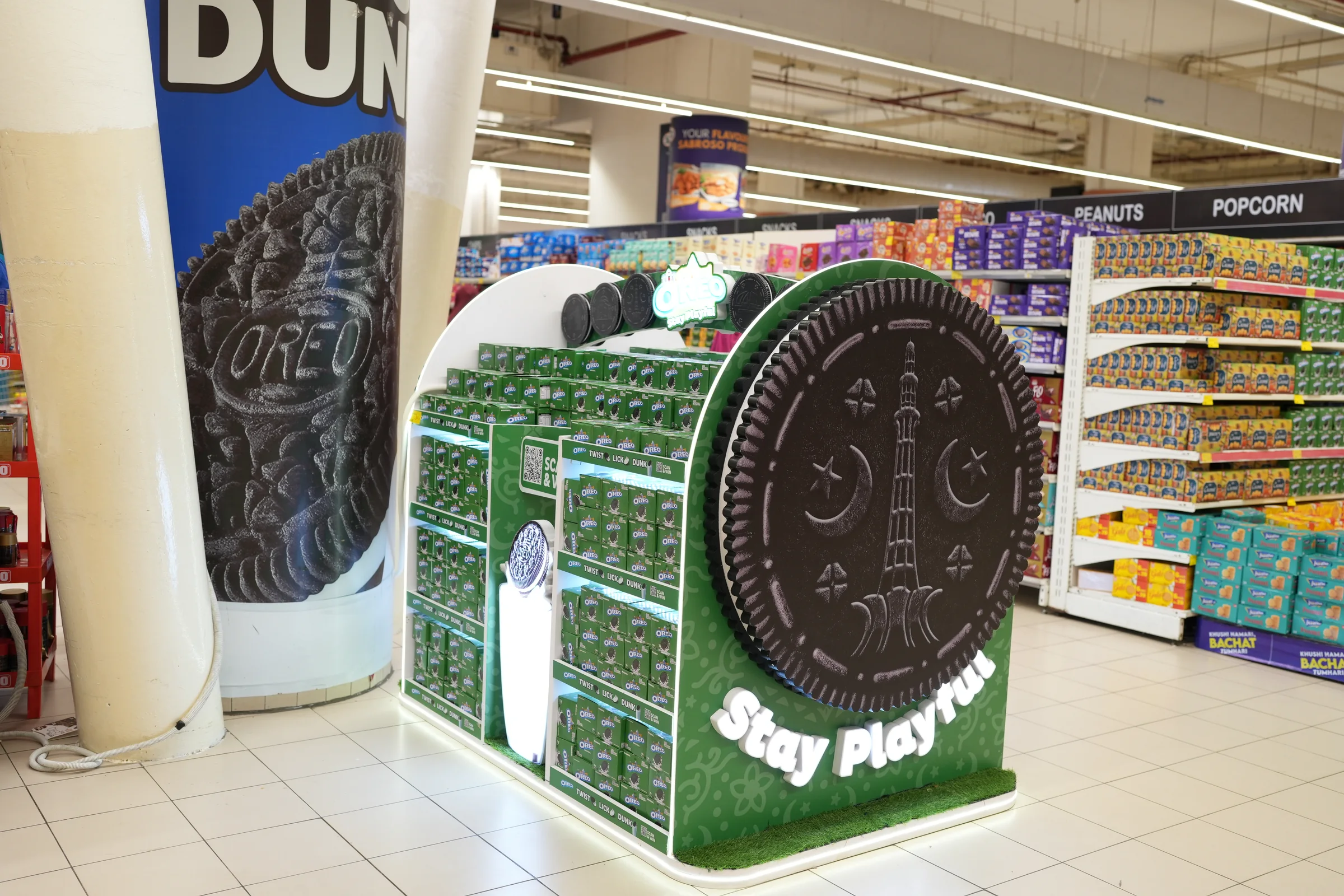 Fully stocked Oreo Stay Playful island with landmark cookie side panels and an illuminated header